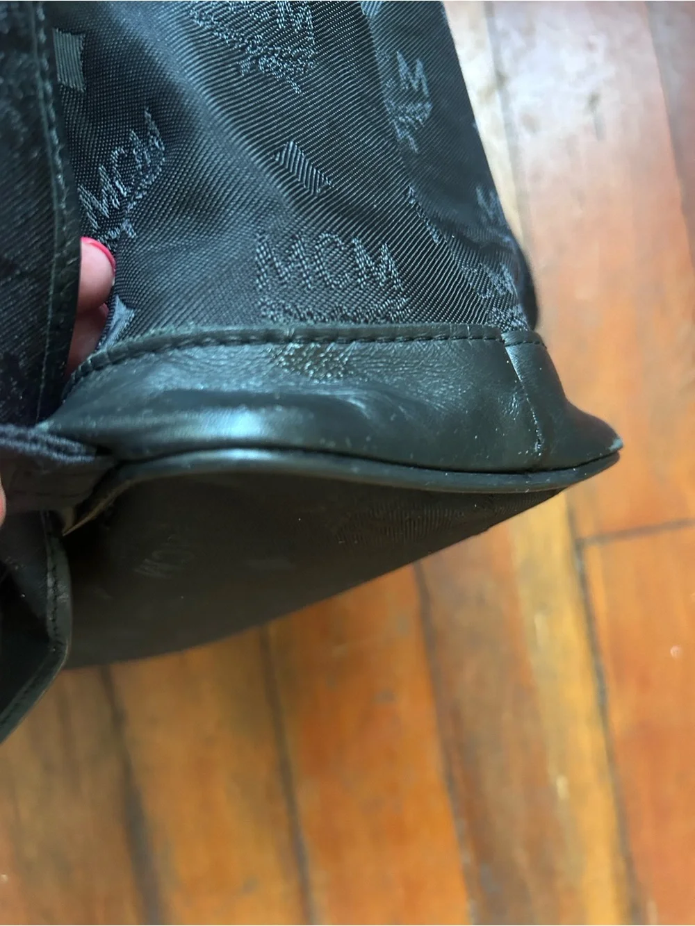 MCM Black Logo Backpack with Gold Plaque